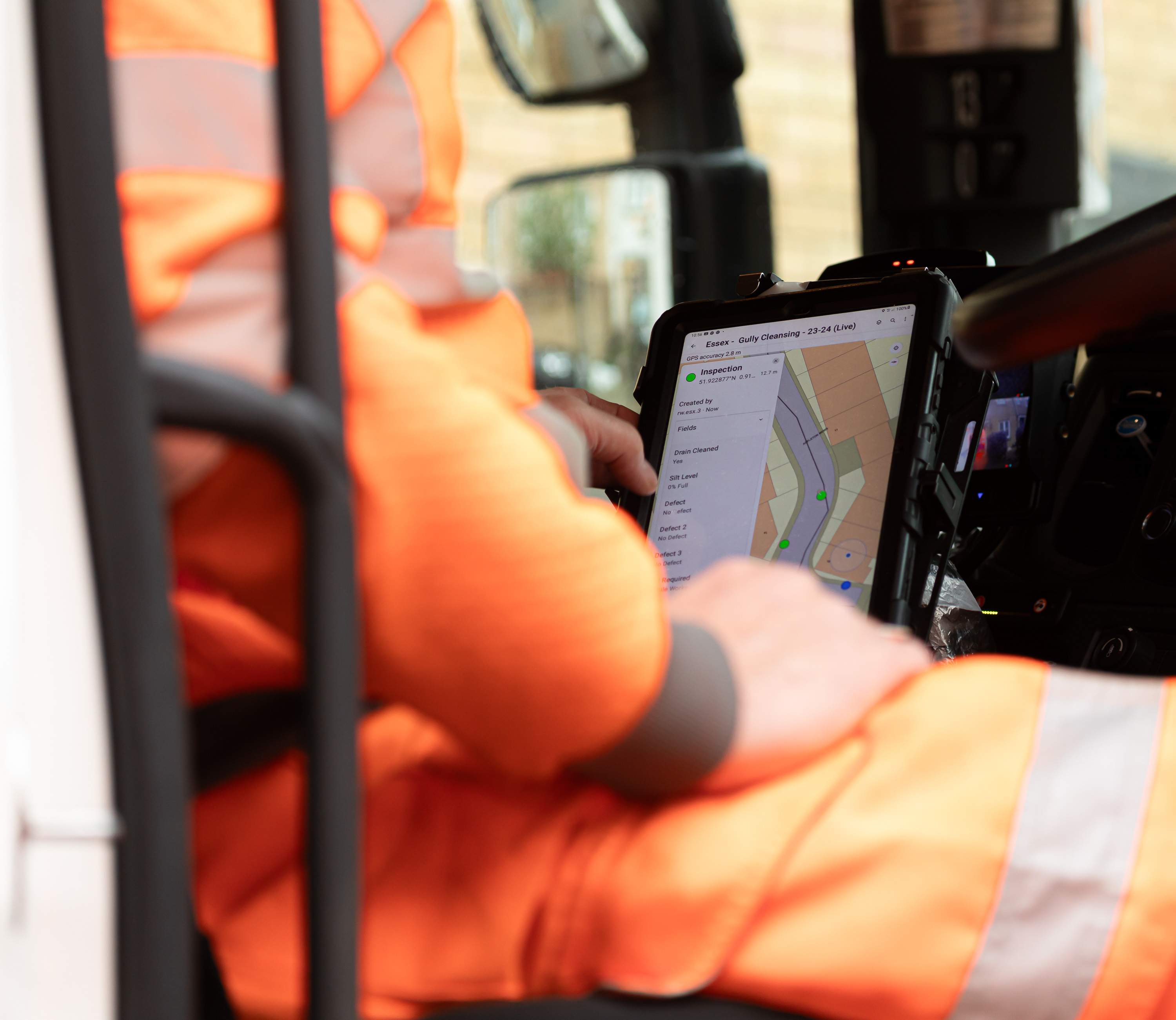 Ringway Jacobs Highways operative using incab digital tablet to record and manage live maintenance