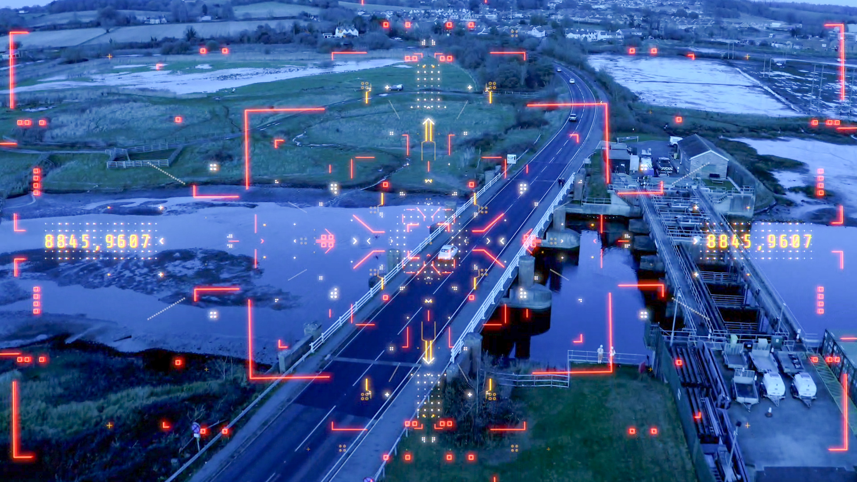 Aerial drone image of a highway junction with visible drone data overlays, used by Ringway Jacobs to assess infrastructure and support best value highway management.